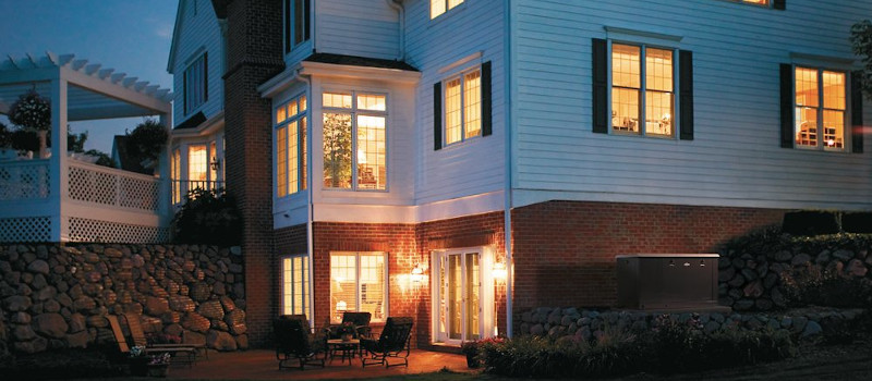 A Home with a Briggs and Stratton Standby Generator has the lights on and power for appliances and during an outage.